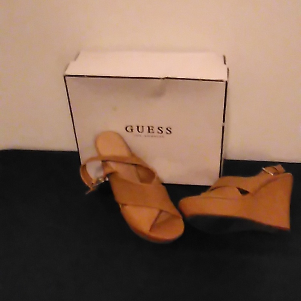 I'm selling Guess Tan Wedges they are Size 8.